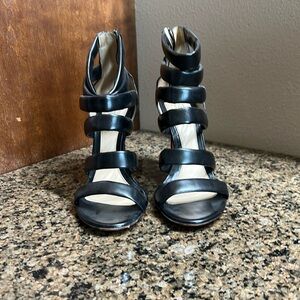 Santoni black heels. Made in Italy. Worn.